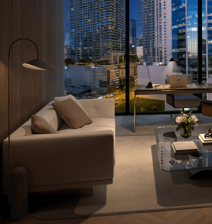 Image of a living room focusing on a sofa and the view from a window.